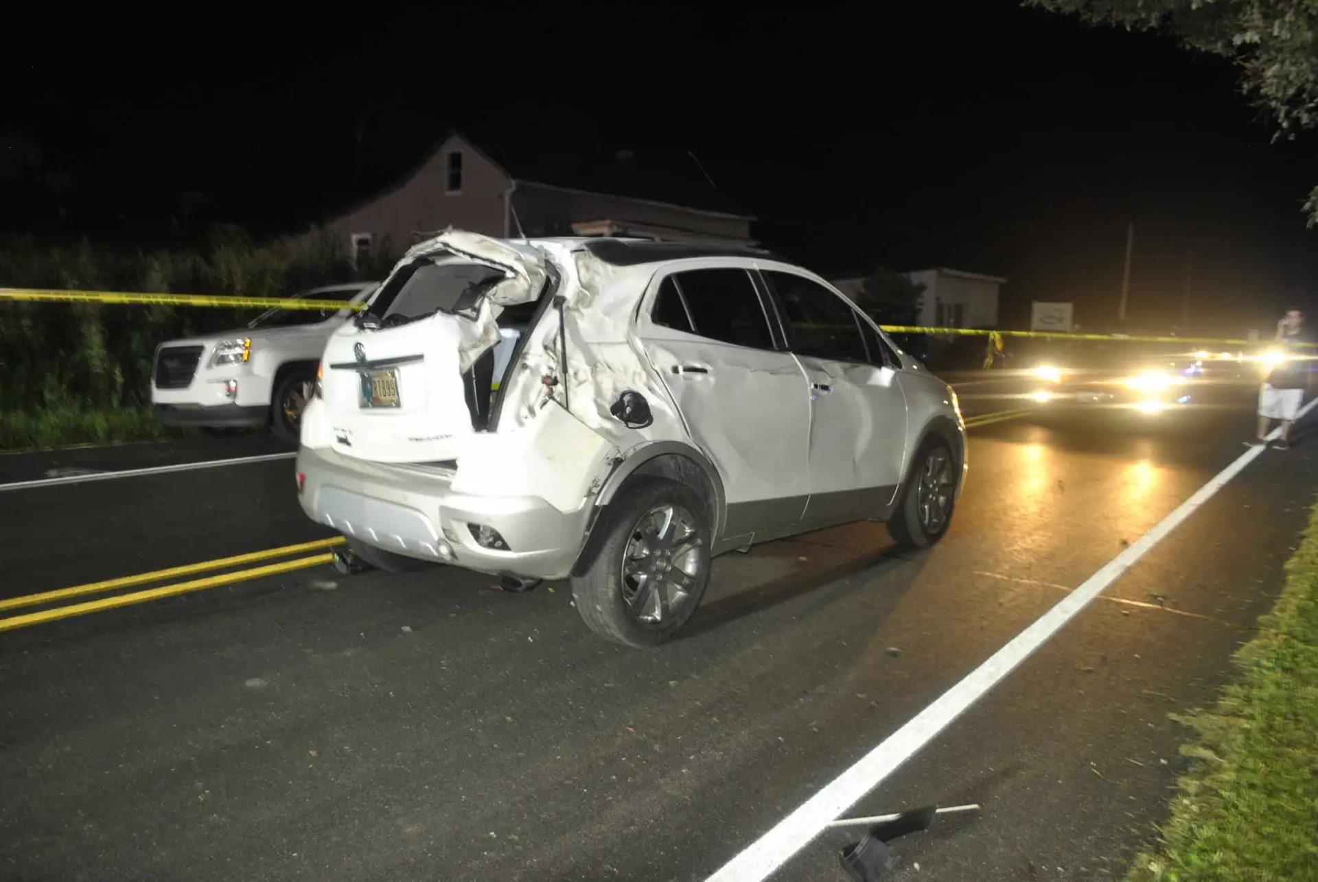 An automobile accident on an Indiana road at night.