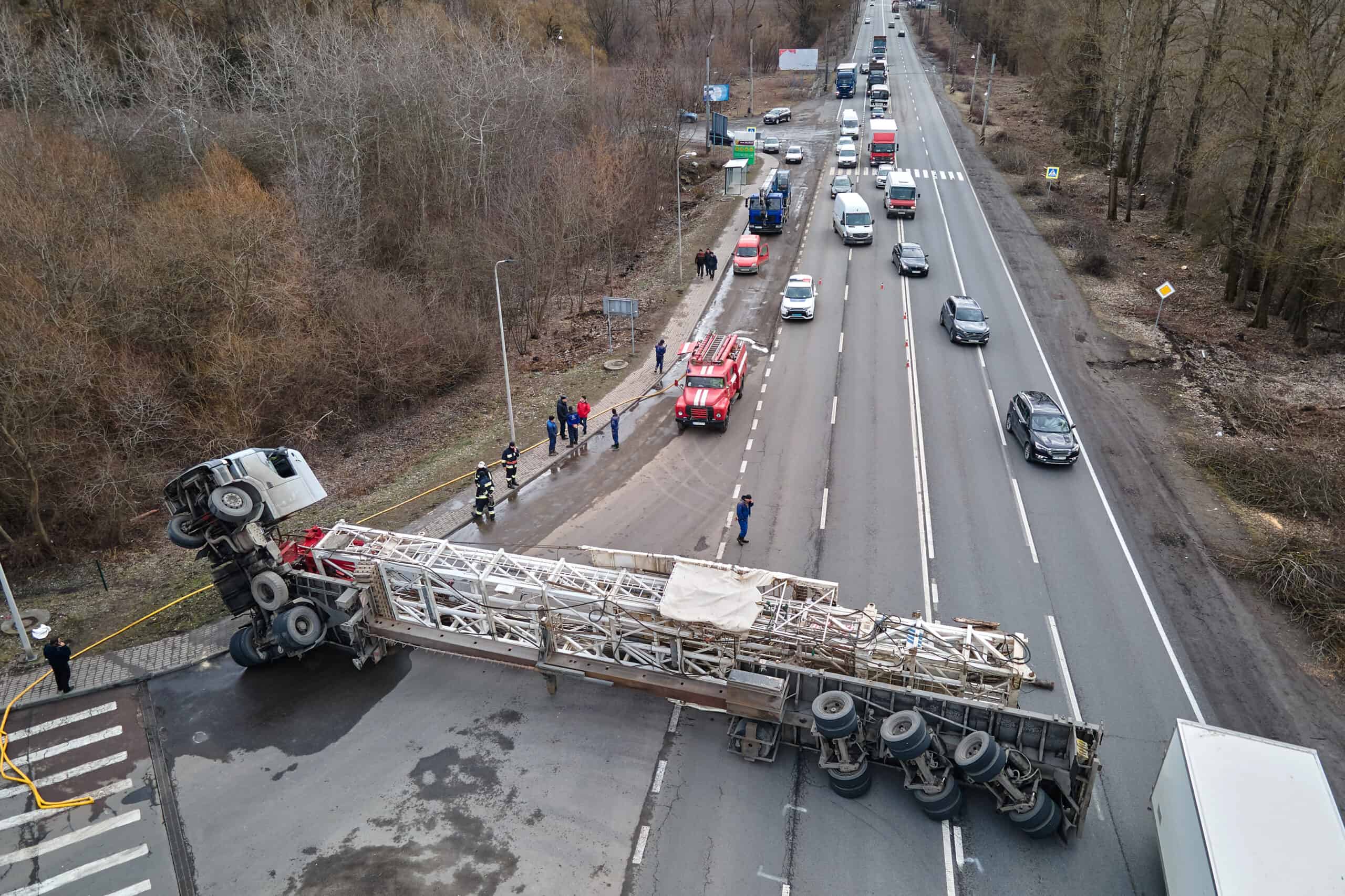 A rollover truck accident causes traffic backups in both directions.