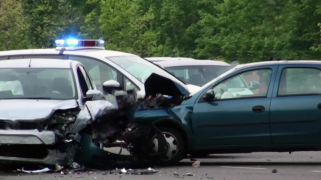 A police vehicle on the scene of a multi-car accident.